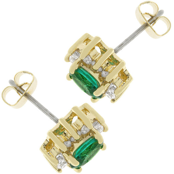 Close-up of a stud earring showing the prong-set cubic zirconia and butterfly post backing