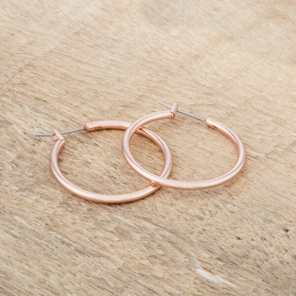 The earrings displayed at an angle to show their profile