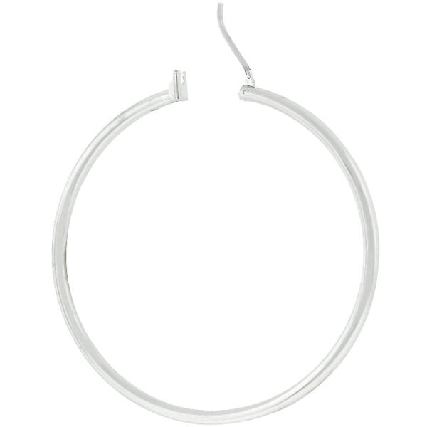 Close-up of one silvertone hoop earring showing the hook backing and metal surface