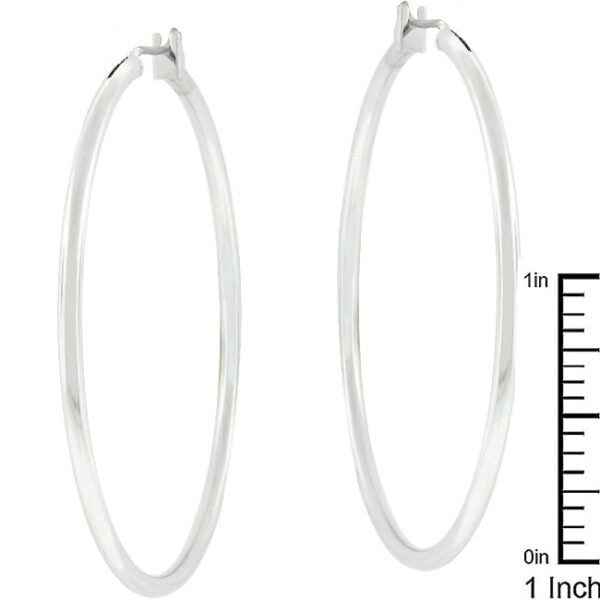 Silvertone hoop earrings photographed at an angle showing the width and open curve of the hoop