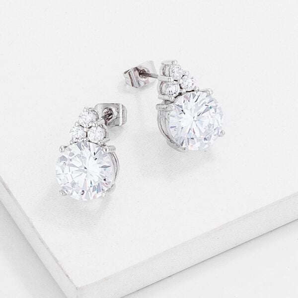 Round clear cubic zirconia stud earring with 6.16 ct total stone weight and silver tone over lead free alloy (brass).
