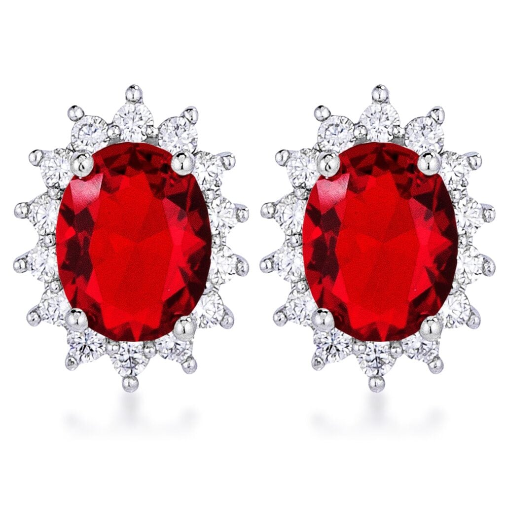 Pair of petite oval earrings with red stones and a rhodium plated silvertone finish