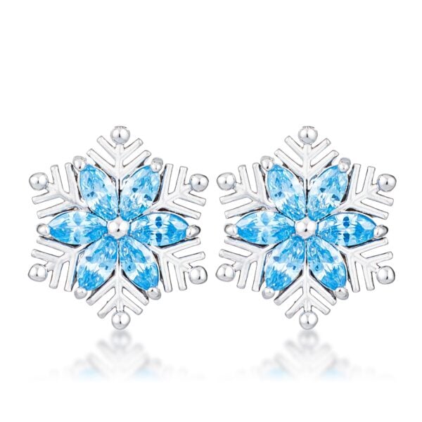 Pair of snowflake shaped earrings set with blue marquise cut cubic zirconia stones in a silvertone plated finish