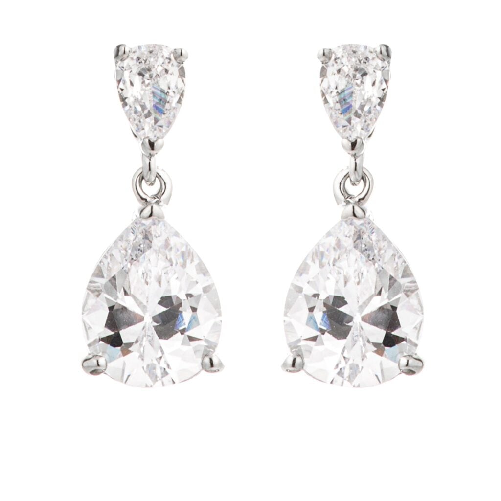Double pear drop earrings with four pear-cut cubic zirconia stones and silver tone over brass.