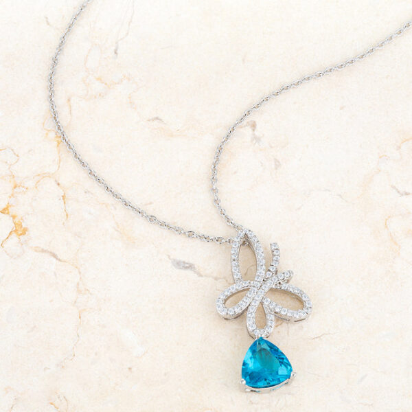 Butterfly drop pendant with aqua cubic zirconia in rhodium plated over lead free alloy (brass).