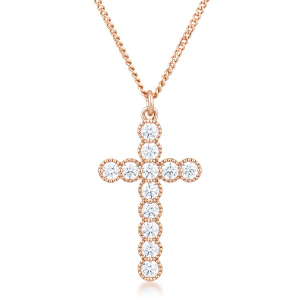 Micro-beaded cross pendant in rose gold plated over brass with clear cubic zirconia.