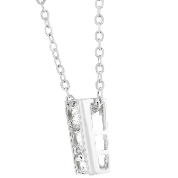 Close-up of round cubic zirconia stones held in a channel setting on the pendant