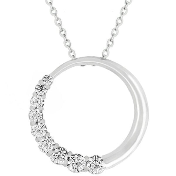 Rhodium plated over lead free alloy (brass) graduated circle pendant with round bezel-set cubic zirconia on a 16 Inch link chain