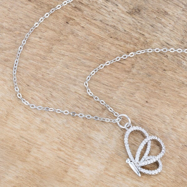 Butterfly pendant necklace displayed at an angle showing light reflecting off the rhodium plated surface