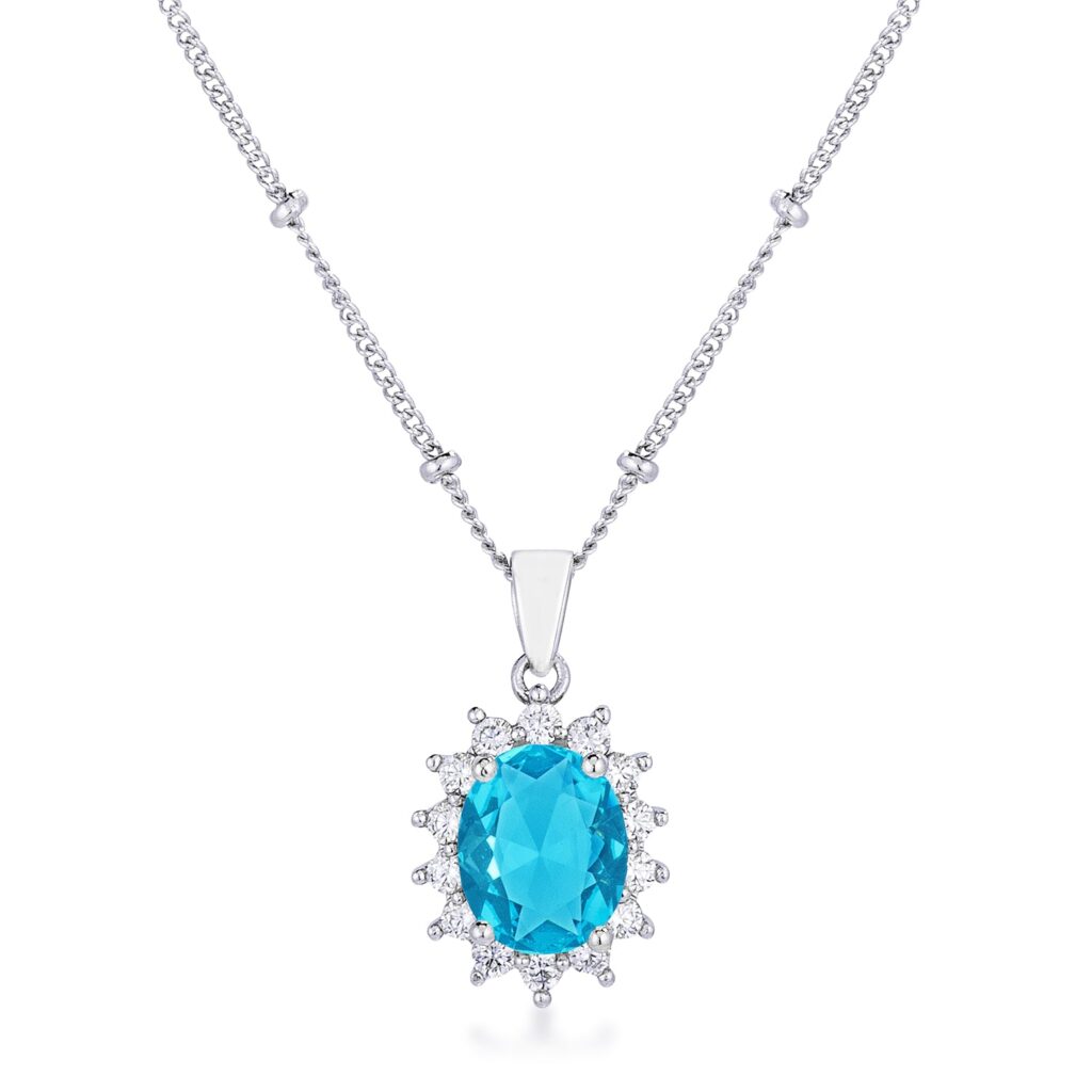 Petite oval pendant with a blue stone and rhodium-plated silvertone finish