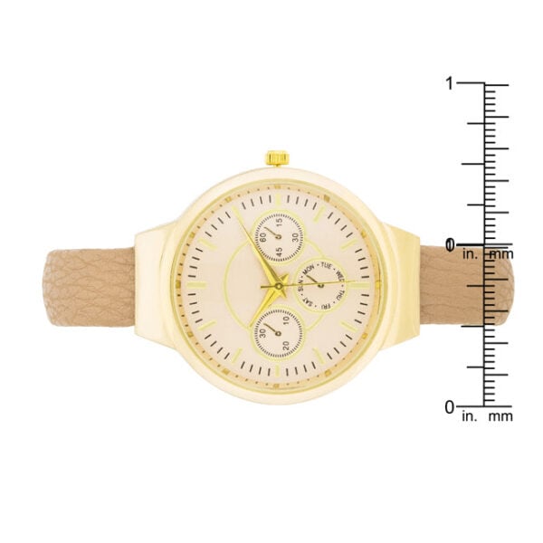 Purple stone detail on a beige leather cuff watch in gold tone over stainless steel.