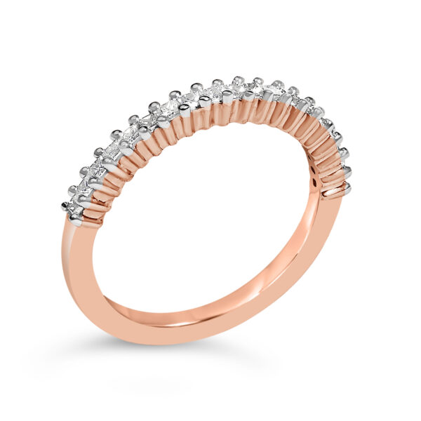 Nineteen natural, untreated Princess diamonds in prong settings on a diamond band ring.