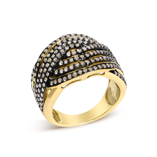 Round natural, untreated champagne diamonds in prong settings on a crossover ring