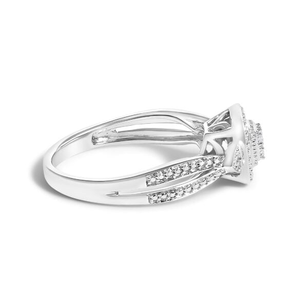 Rhodium plated over gold promise ring with natural round diamonds held in prong settings.