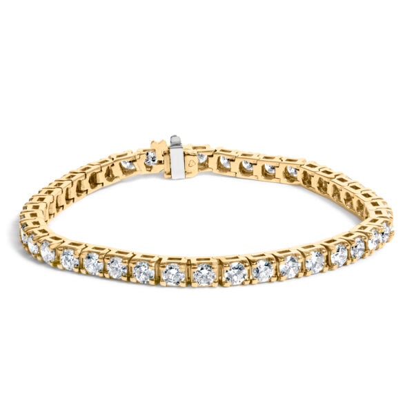 14K yellow gold tennis bracelet with 40 round prong-set diamonds arranged in a continuous line