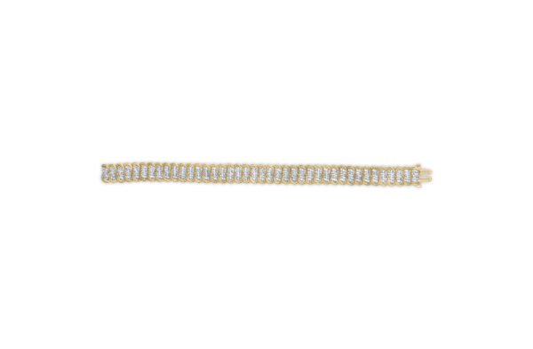 10K yellow gold diamond S-link bracelet coiled to show its flexible chain structure