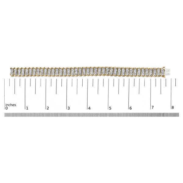10K yellow gold diamond S-link bracelet shown next to a ruler for scale