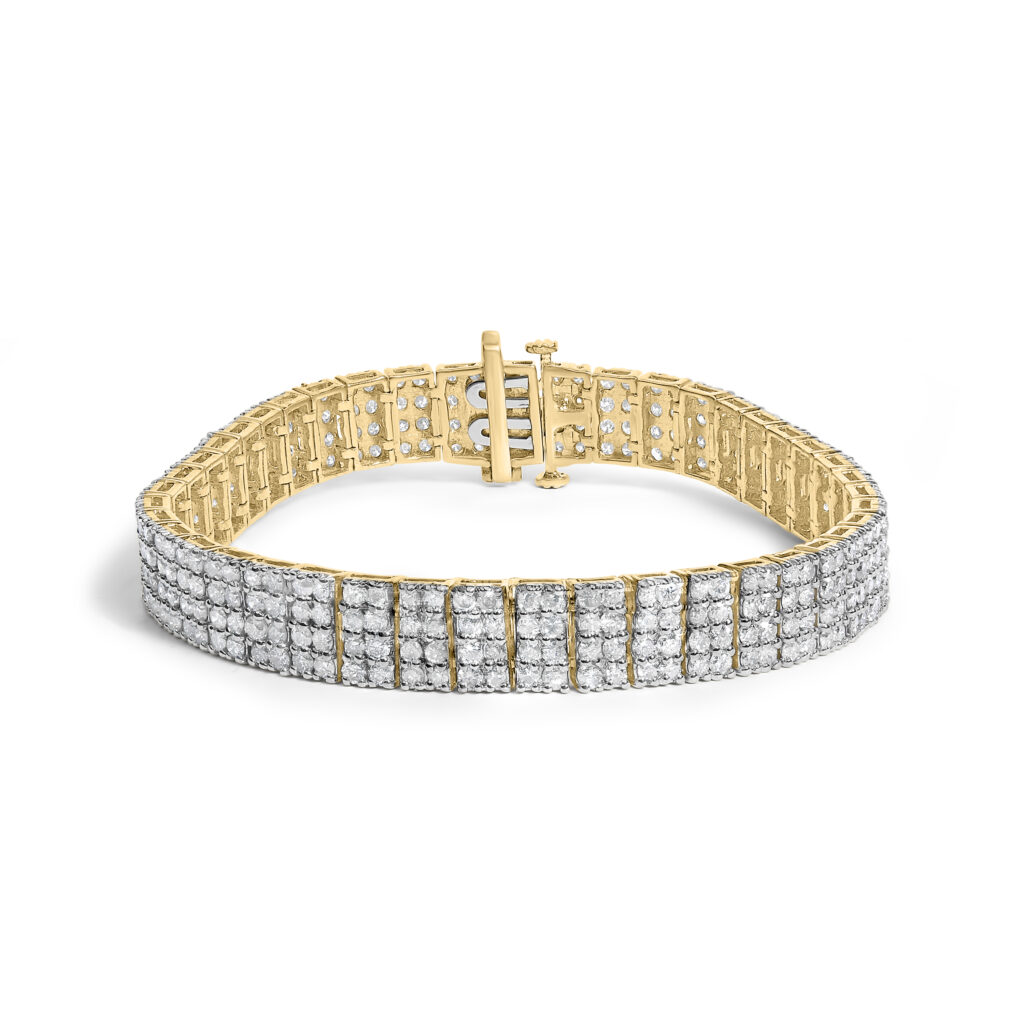 Four-row diamond tennis bracelet in 14K gold plated sterling silver, laid flat to show its full 7.25 inch length