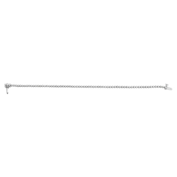 Sterling silver tennis bracelet shown from an angle highlighting the box clasp with latch