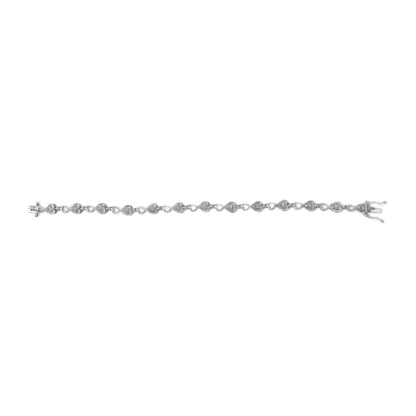 Close-up of the heart-shaped links showing prong-set round diamonds
