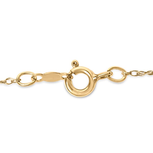 Close angle of the evil eye motif showing prong-set diamonds and the 14K gold plated finish