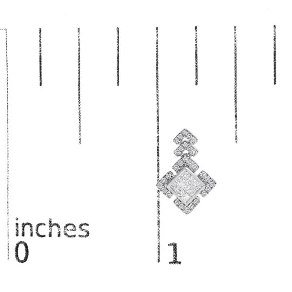 Earrings shown next to a scale reference to indicate their actual size