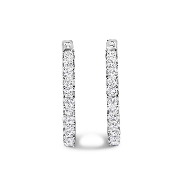 Close angle of the hoop earring showing individual princess-cut diamonds held by prong settings