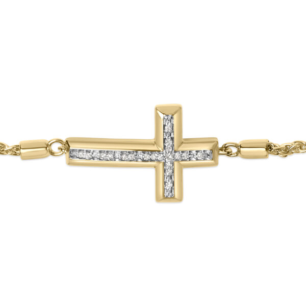 Close-up of the pave diamond setting on the vermeil cross bracelet