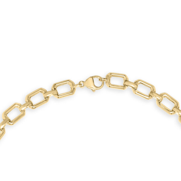 Angled view of the necklace showing light reflecting off the pave diamonds