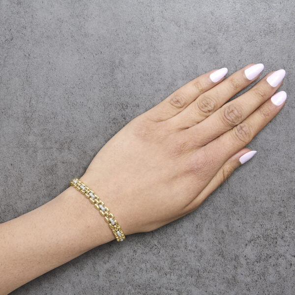 Panther link bracelet worn on a wrist showing the clasp and fit