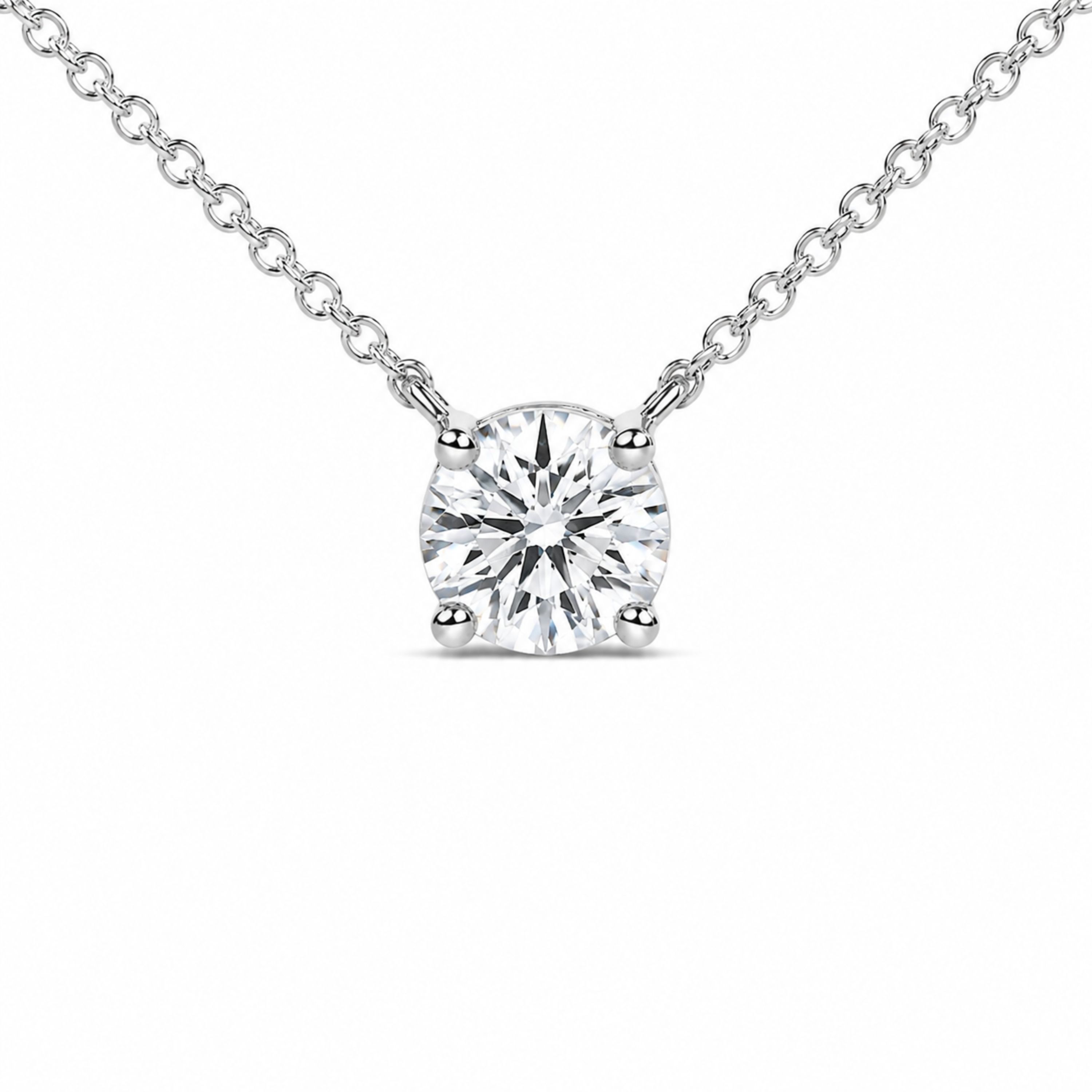 Side angle of the diamond pendant showing the open sides of the prong setting in white gold