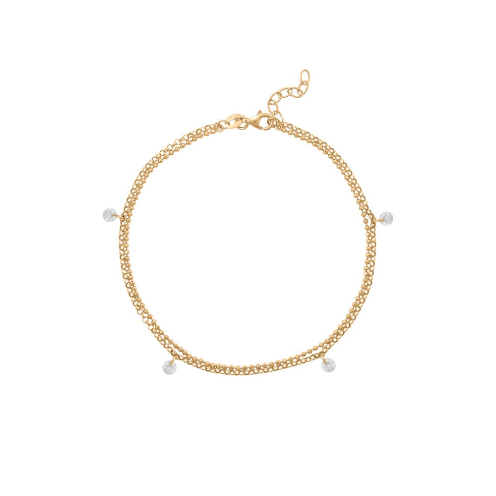 Double-strand anklet in 14K gold plated over .925 sterling silver with 4 mm cubic zirconia and a lobster clasp.