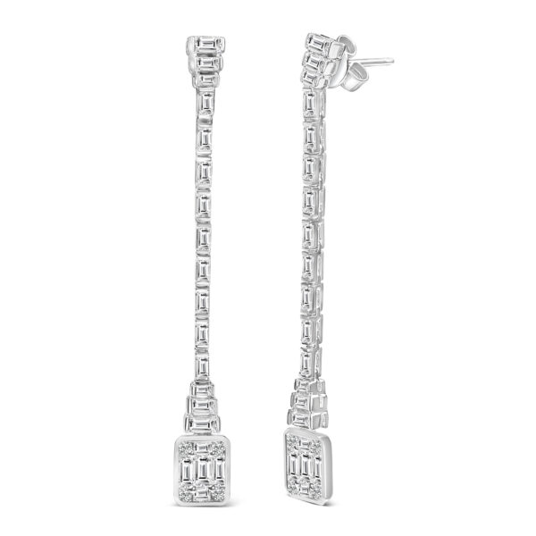 Close view of one earring showing the channel-set baguette diamonds leading to a bezel-set diamond mosaic