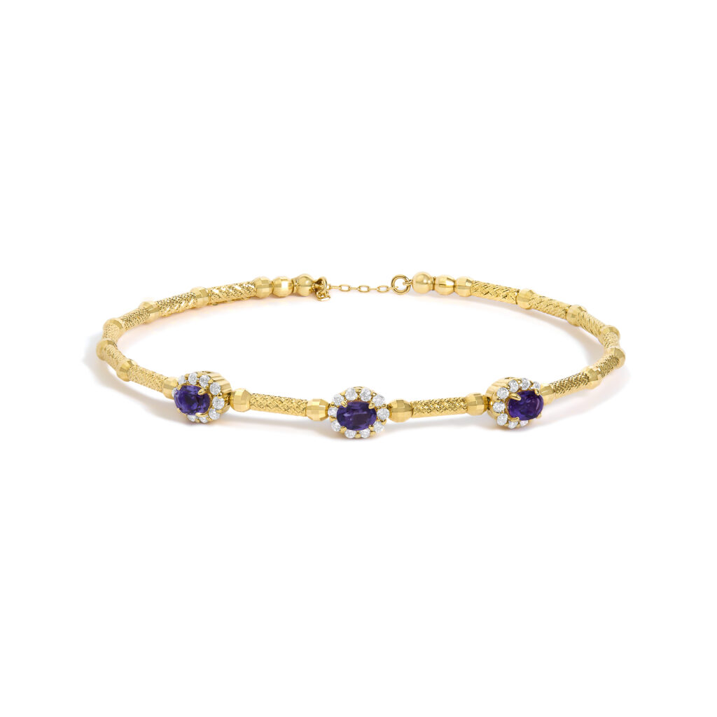 18K yellow gold bracelet with three oval amethyst stations surrounded by diamond halos