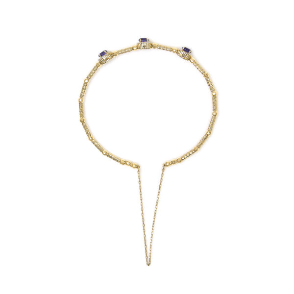 18K yellow gold bracelet laid flat showing all three amethyst and diamond stations