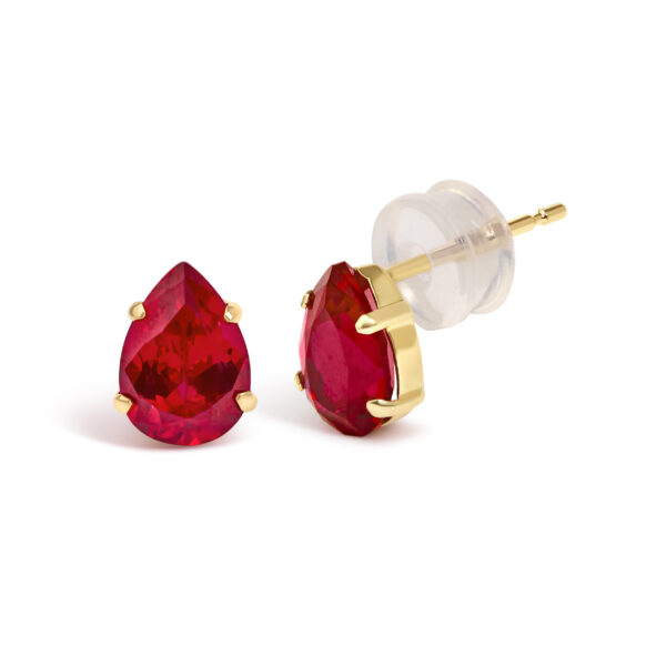 Side angle of the 18K yellow gold ruby stud earring showing the prong setting and post