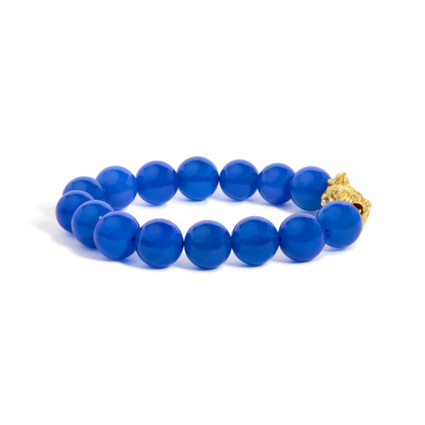 Close view of blue agate beads showing natural color and surface pattern