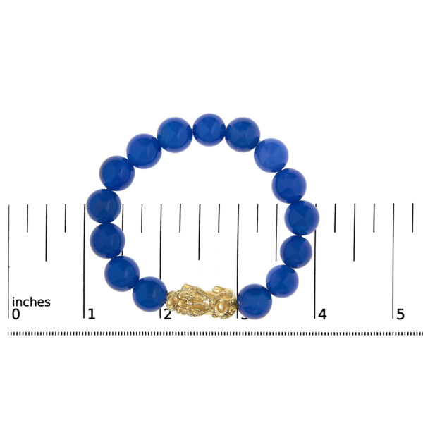 Bracelet shown next to a ruler indicating its 8 inch length