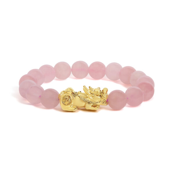 Gold dragon charm bracelet strung with round pink rose quartz beads