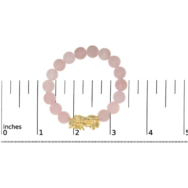 Bracelet laid flat showing full length and bead-to-charm proportion