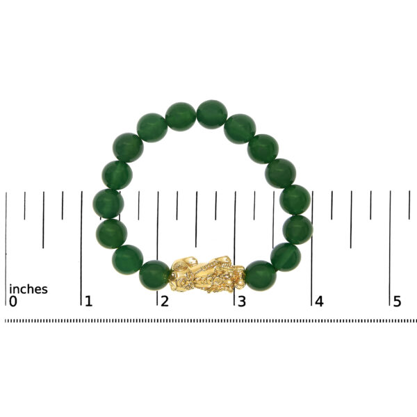Bracelet shown next to a ruler indicating its 7.5 inch length