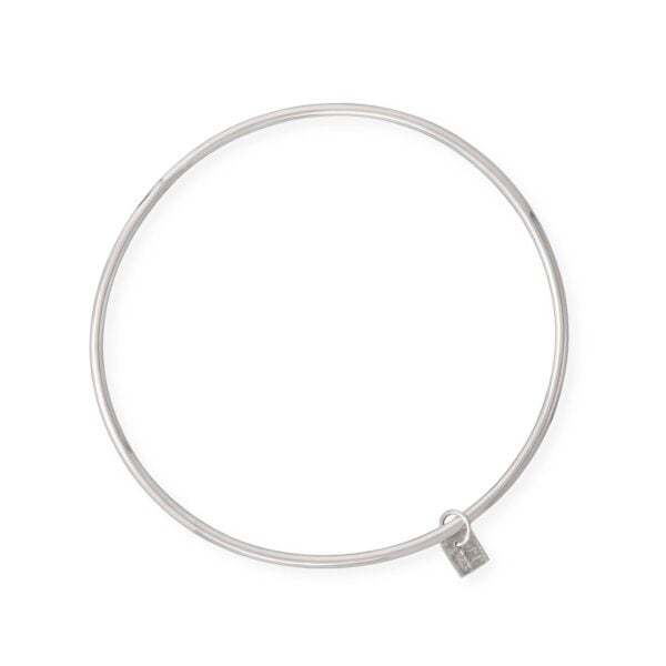 Round sterling silver bangle bracelet with a small square charm dangling from the wire