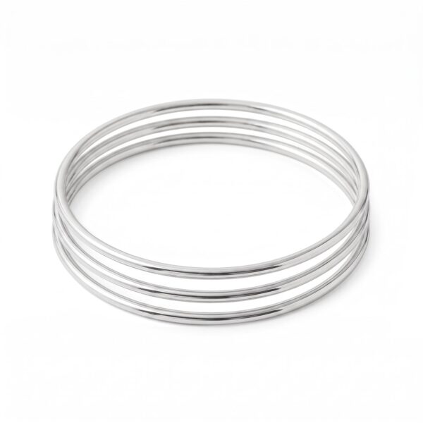 Sterling silver bangle bracelet shown from a second angle showing the wire thickness