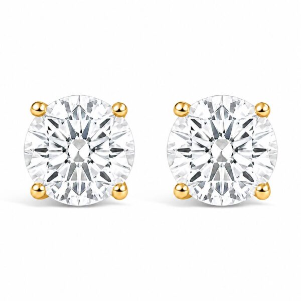 Pair of solitaire stud earrings with 2 round lab-grown diamonds in 4-Prong settings.