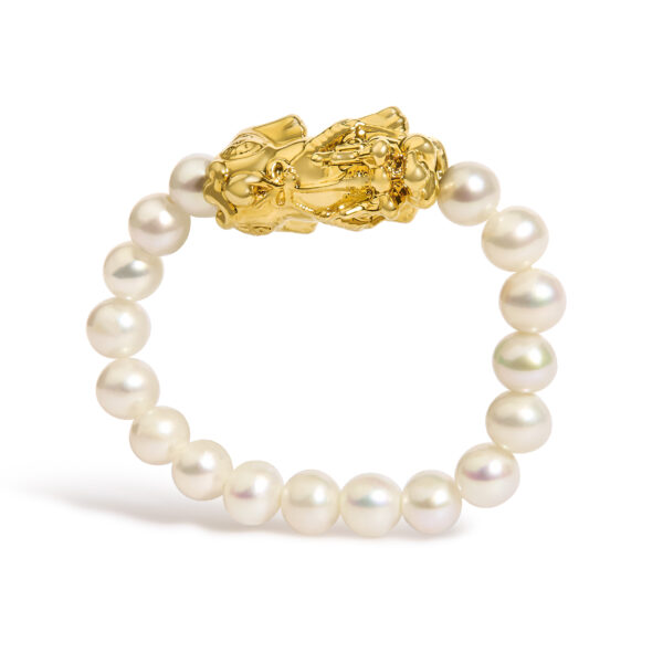 Gold dragon motif ring with a row of small white freshwater pearls along the band