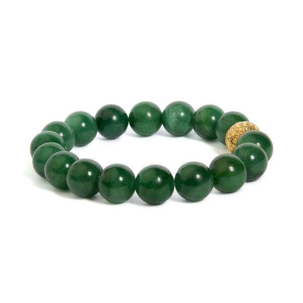 Close-up of round aventurine cabochon beads showing their polished surface and included clarity