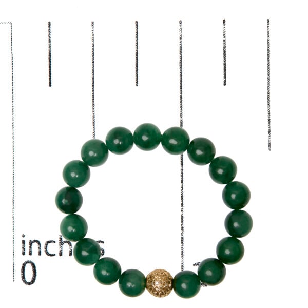 Aventurine beaded bracelet shown next to a ruler indicating its scale