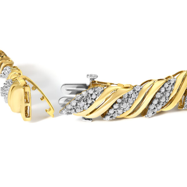 S-link twist bracelet in 10K yellow gold turned to show an alternate angle of the diamond links