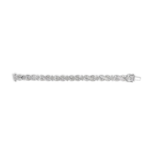 Detail view of invisibly set princess cut diamonds within the geometric link bracelet