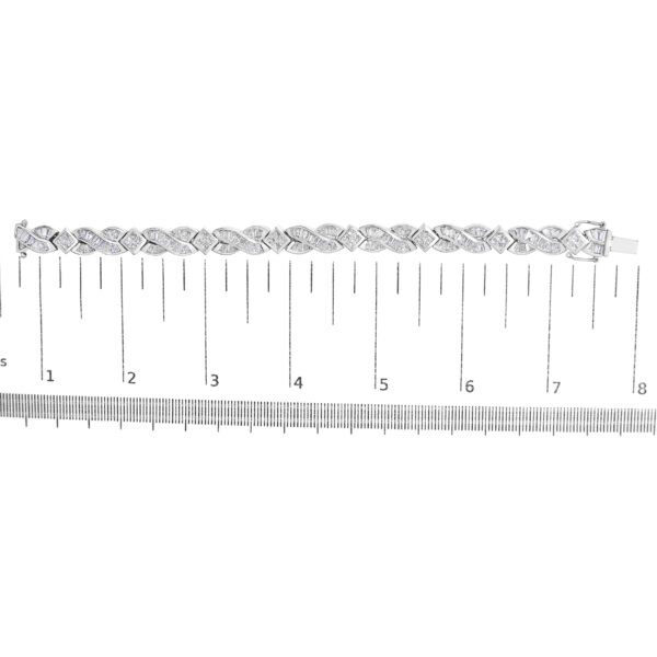 Bracelet shown with a scale reference indicating its 7 inch length